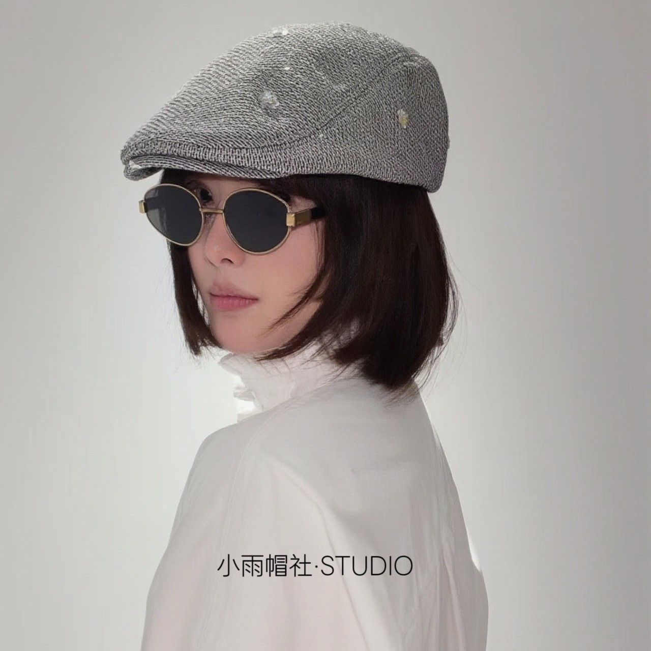 小雨帽社STUDIO的LOGO