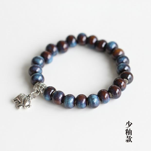 Giá trị [quên thời gian] nhiệt độ cao hoa men gốm đặc trưng vòng tay đính cườm thạch anh tóc đỏ
