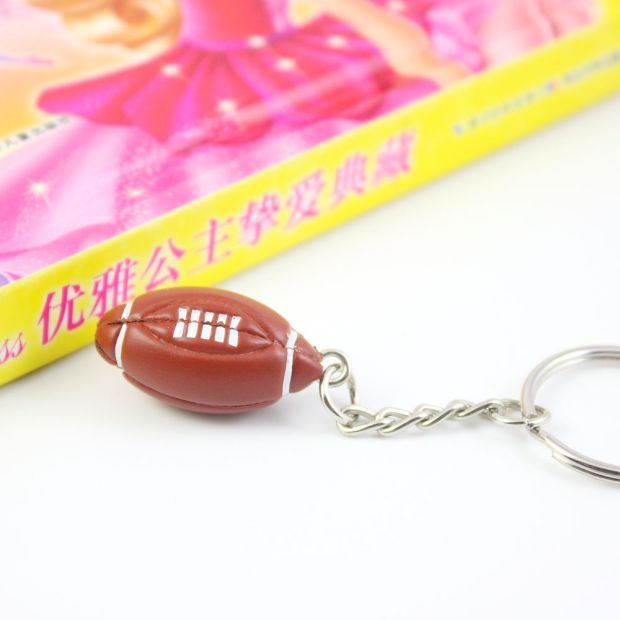 Mini Football Keychain Mặt dây chuyền Quạt Vật tư cạnh tranh Quà lưu niệm Đồ dễ thương Rugby bóng bầu dục Mỹ