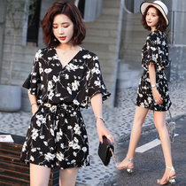 European station summer clothes new foreign style fashion printing V-neck short sleeve dark buckle waist shorts cool jumpsuit womens tide