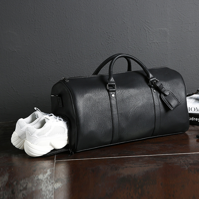 Hong Kong cowhide fashion Men's portable travel bag leather large capacity boarding bag business short trip