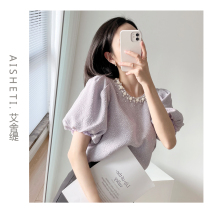 Esherti French niche coat Hepburn style 2021 summer new nail ball round neck bubble sleeve chiffon shirt Women