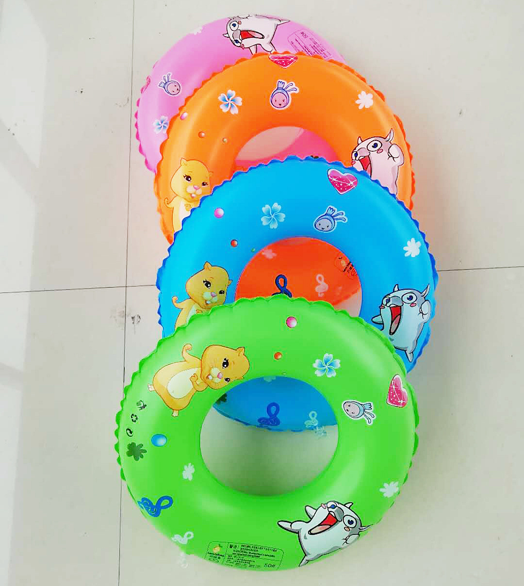 Nhà máy trực tiếp người lớn trẻ em bơm hơi 50 vòng tròn hoạt hình bảo vệ môi trường dày PVC vòng bơi chống trượt các loại phao bơi