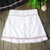 Đại học gió chống quần tennis nữ thể dục nhịp điệu váy váy ngắn váy gấp trăm váy xếp li chính hãng 0811 vợt tennis head 275g Quần vợt