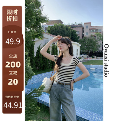 taobao agent Ouyang Xi sweet spicy wind stripes knit black and white striped female summer wearing a design sense niche inner top top