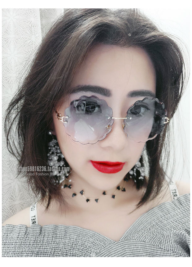 Jiang Shuying với những bông hoa không khung cắt tỉa kính râm màu thời trang phim biển màu đồng bằng kính kính cartier