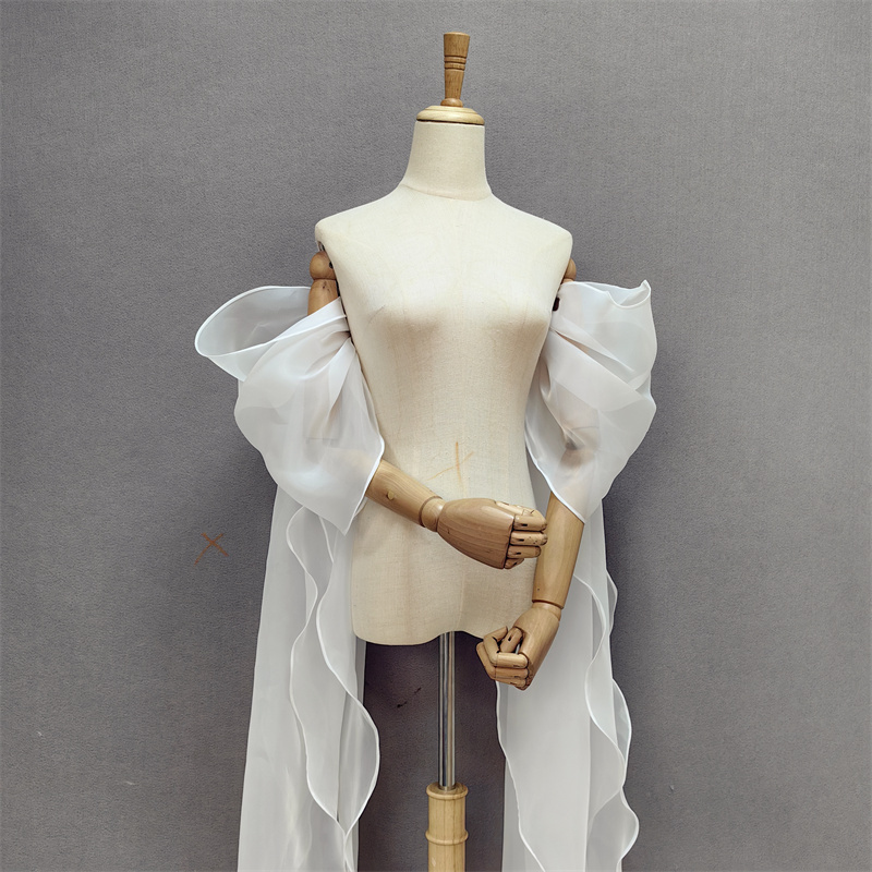 Katie's Bridal Wedding Dress Accessories Include Long Flowing Ribbons, Romantic Puff Sleeves, and Detachable, Versatile Styling Sleeves