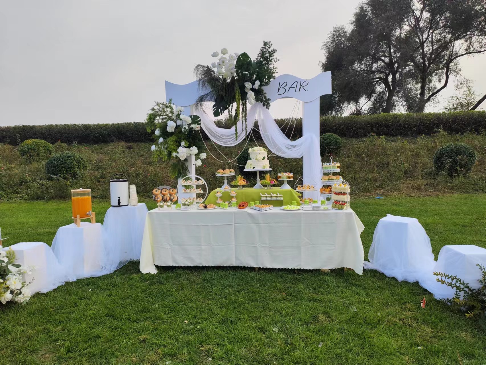 Bride and groom in a minimalist wedding setting with simple decor and lots of open space around them