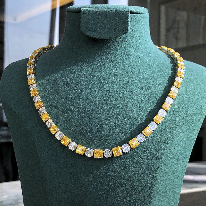 The Main Diamond Weighs a Total of 43.807 Carats, the Secondary Diamonds Weigh a Total of 9.69 Carats, and the 18K Gold Radiant-Shaped Diamond Necklace Is Luxuriously Adorned with Diamonds