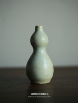 Green and white glazed gourd bottle