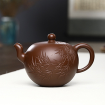 Teacher Di a gold medal national worker a leather mud from the No. 1 Raw Mine Factory a bead Yixing purple clay teapot handmade photo of the teapot