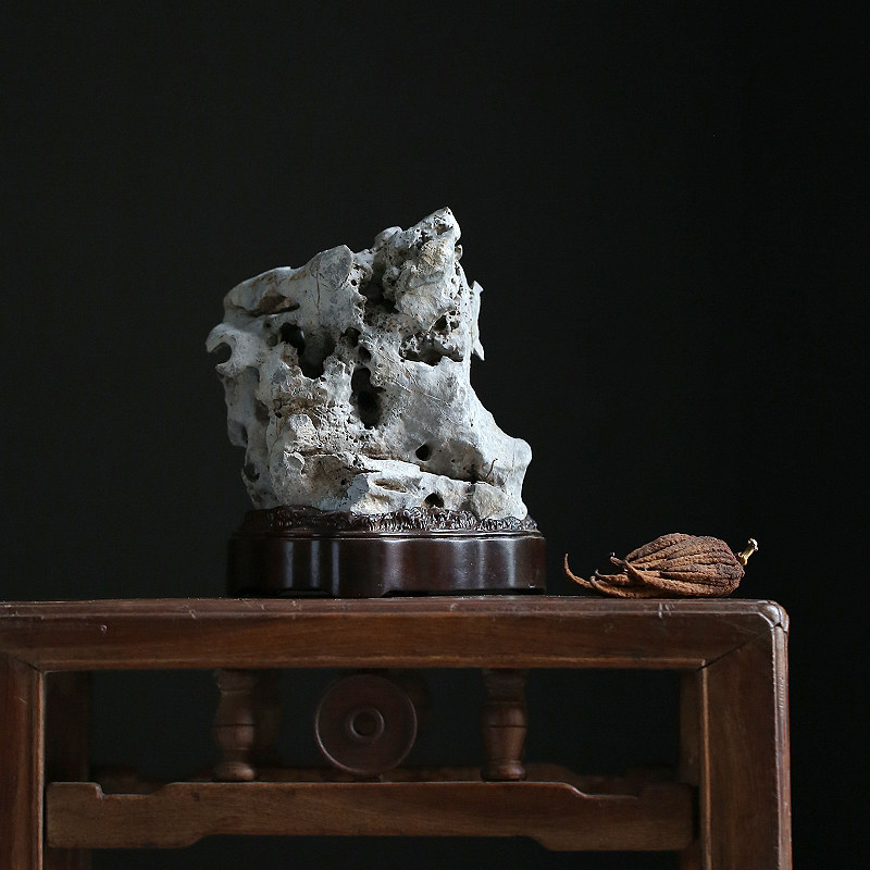 Jingchi Qing tea space study desk elegant stone natural Taihu stone appreciation stone Sugong ebony base