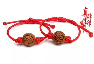 True evil peach core carving Zodiac Baby hand baby child pressure shock feet red rope safe life year
