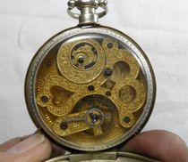 A particularly rare antique large eight-piece pocket watch No 2 hand-carved gilt large horoscopes with loops