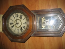 Antique old octagonal wall clock