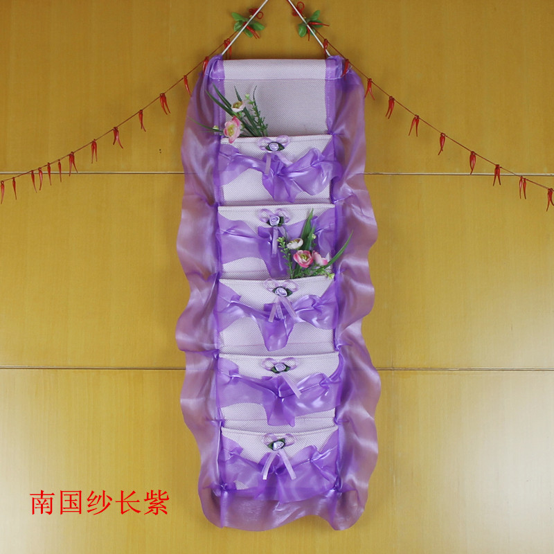 Home fabric hot sell lace wall multi - layer small collection bag wall hanging bag behind door storage bag 1 piece
