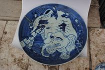 Qing Kangxi blue and white porcelain washing image pattern plate