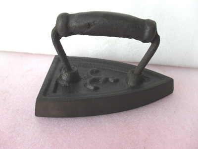 Old tool cast iron iron