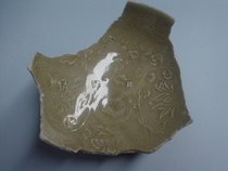 A piece of the printed bowl of the Longquan Kiln of the Yuan not Ming Ming