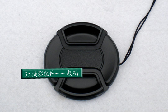 The middle pinch wordless 43mm lens cap is threaded