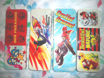 Stock nostalgic old tin stationery box worker reading card