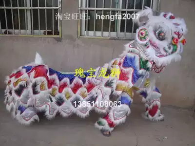 Dragon lion factory specializes in the production of dragon dance lights and lion dance fire props:student double south lion Buddha dressed as a lion white color