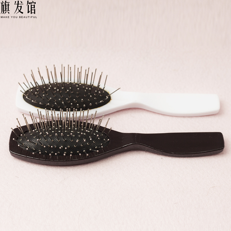 旗发馆假发专用钢梳 喷上柔顺剂之后使用它从下往上梳理假发