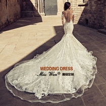 2021 new luxury long tail slim one shoulder long sleeve lace waist fishtail high-end custom bridal wedding dress