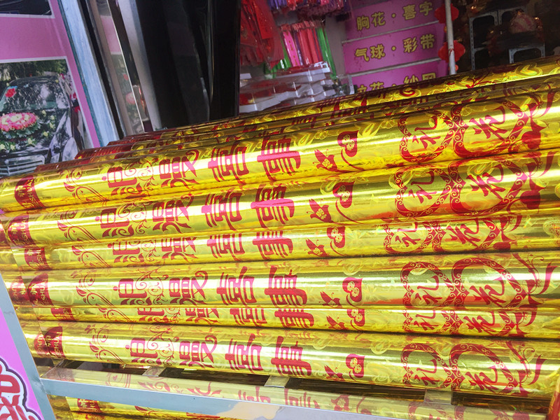 Guangdong Shuai laser packaging 1 meter long button rotating fireworks tube Wedding festival supplies salute factory direct sales