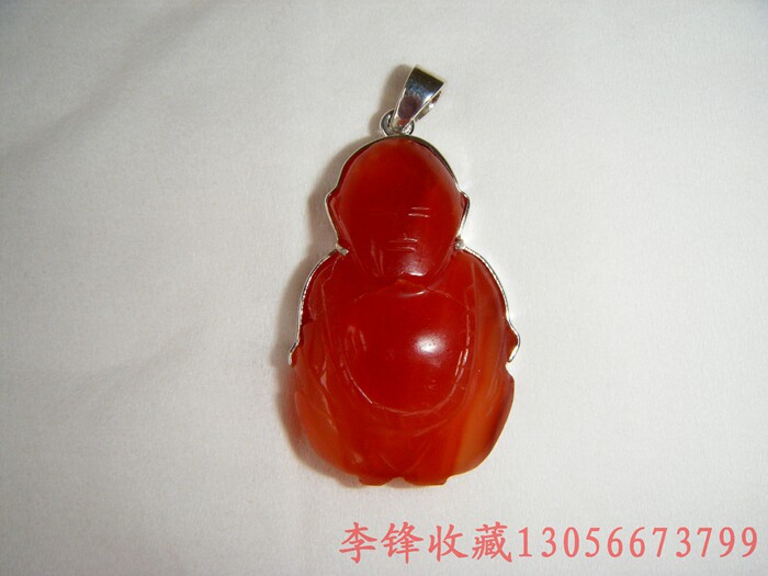 The rare red agate carving Luohan hat in the Qing Dynasty, the hat flower, the jade flower, and the beautiful red DIY pendant (bao Lao)