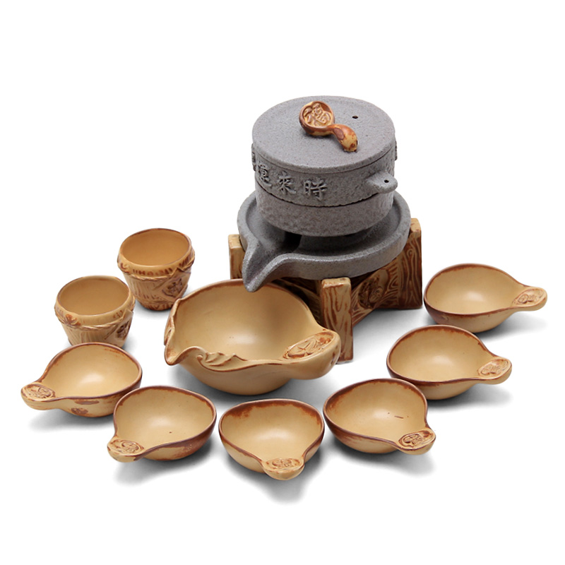 Mingyuan FengTang archaize coarse pottery stone mill semiautomatic kung fu tea set creative lazy character of a complete set of tea set