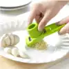 Household stainless steel garlic press Garlic press Plastic kitchen garlic manual pounding machine squeezing garlic peeling garlic ginger foam