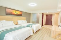 The luxury double-bed room of Chongqing Jiu Love Shuguang Hotel (the first light and city shop of the University City)