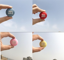 Car perfume aromatherapy cute M bean chocolate car air outlet car clip car interior decoration diffuser stone ornaments female