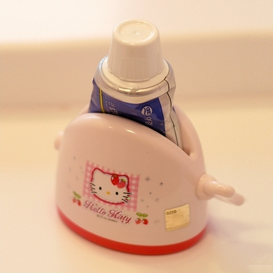 South Korean imports of the genuine Hello kitty plastic squeeze toothpaste partner