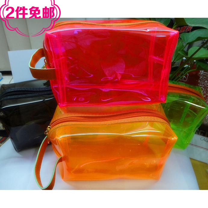 Special price new waterproof translucent candy color makeup bag finishing pack containing bag phone bag women's bag
