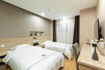 Good Home Business Guest House in Chuzhou (World Trade House shop) Whirlpool Common Double Bed Room (inner window)