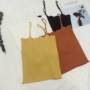 Mùa hè mới ngắn ngắn màu đen và trắng dệt kim hàng đầu vest phụ nữ sang trọng linh hoạt tự tu luyện bên trong một chiếc quần nhỏ - Áo ba lỗ quần áo thể thao nữ