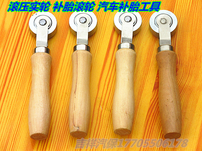 Automotive tire re-tire pressure wheel re-tire roller compact roller cold-replenished negative tire repair pressure wheel tire tool