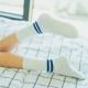 Vớ nữ mùa thu và mùa đông Hàng đống vớ của Nhật Bản bằng vải cotton nữ vớ ống đại học gió thấp hai thanh sọc vớ nữ tất cao cổ đến gối Bít tất nữ