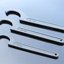 Universal wrench crescent hook type round nut wrench for water meter cover shock absorber disassembly and assembly tool