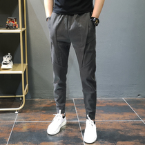 2021 early spring new mens casual pants Korean version of solid color slim-fit small pants Japanese wild tie-up nine-point pants tide