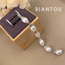 Baroque pearl pendant earrings Atmospheric asymmetrical flow Suitable for round face temperament net red ear nail long ear decoration