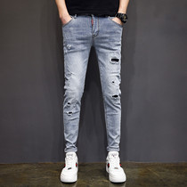 Light-colored ripped jeans mens fashion brand Korean version of the wild scraped beggar pants spring nine-point slim-fit small feet pants