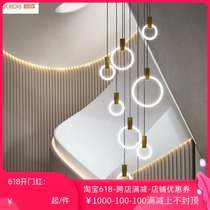 Halo jump layer metal Villa staircase long chandelier Nordic living room creative hollow dining room rotating compound building chandelier