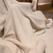 From a 95% wool shimmering black knitted skirt winter with sweater French vintage high waist skirt