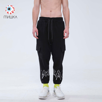 mishka big eye ball American Tide brand knitted print nine-point radish pants trend Spring New