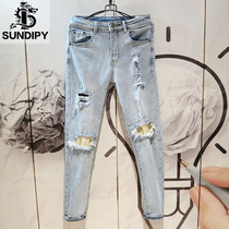  2020 early spring new denim trousers slim-fit mens Korean version of the hole washed trend street small feet pants