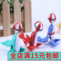 Children and children chain dolphin toy clockwork sea lion top ball animal seal toy 360 degree rotating string wholesale