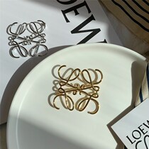 Net red with brooch European and American niche design advanced sense abstract geometric lines hollow brooch exquisite simple tide